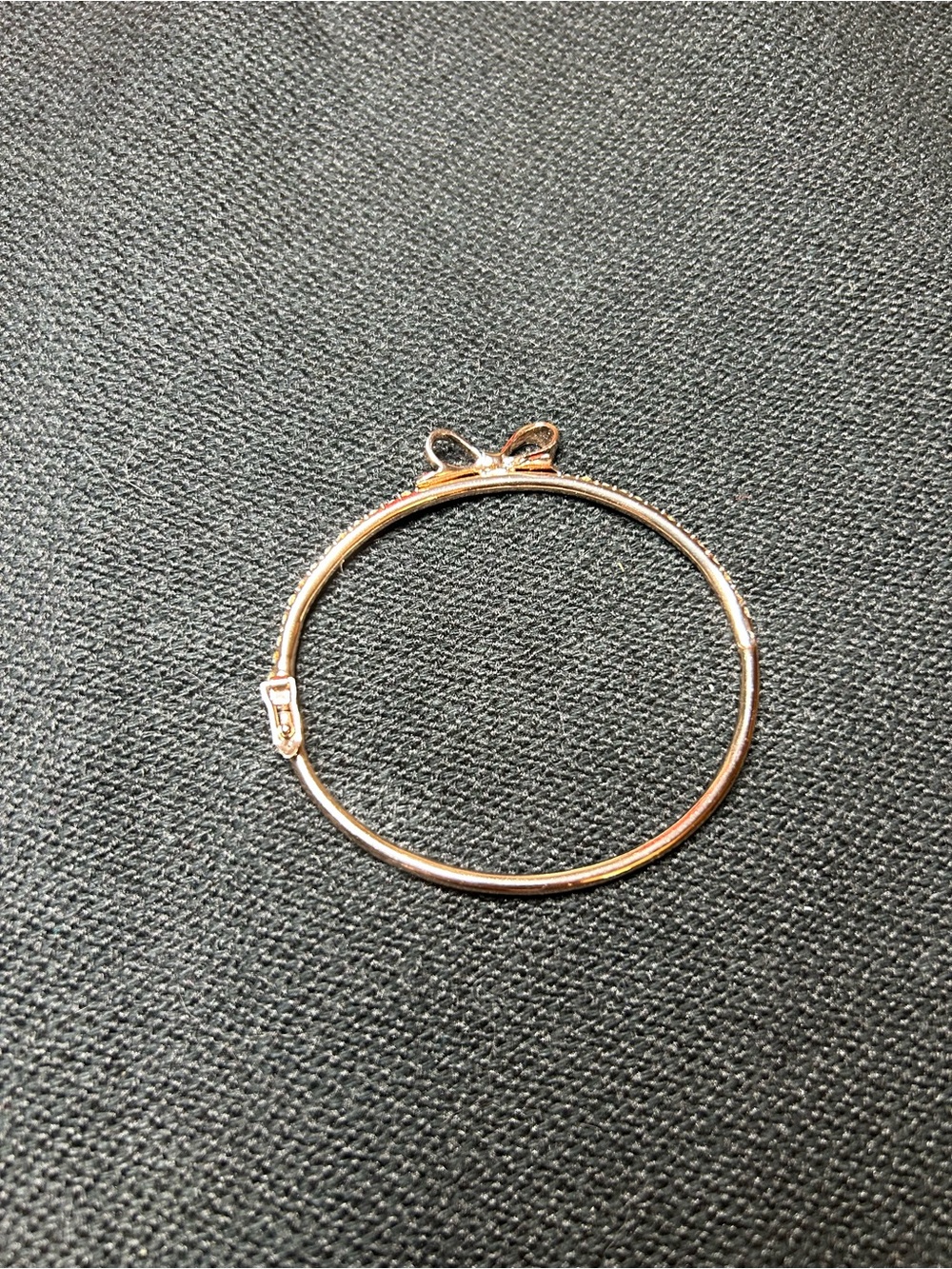 Kate Spade New York Gold-Tone Bow Bangle Bracelet with Crystal Accents - Picture 8 of 9